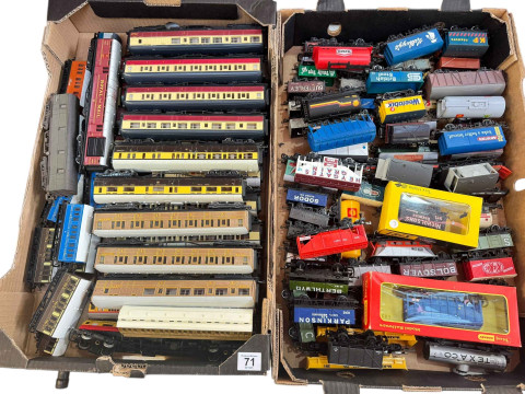 Two boxes of train carriages including Hornby, Trix Trains, etc.
