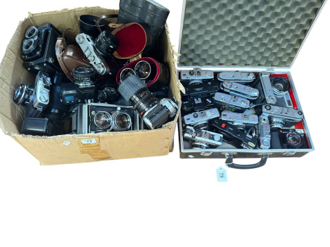Box and case with various cameras including Mamiya C33, Microcord, Contax...