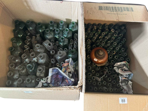 Two boxes of glass bottles, WWI bomb fuse inkwell, Edwardian seed pearl...