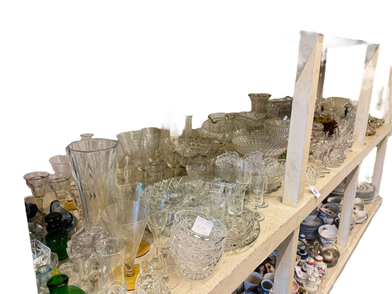 Large collection of glass including cruet sets, decanter stoppers, etc.