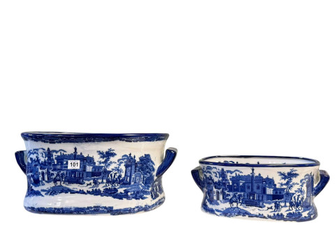 Two blue and white footbaths.