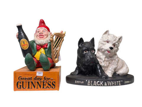 Two novelty advert doorstops.