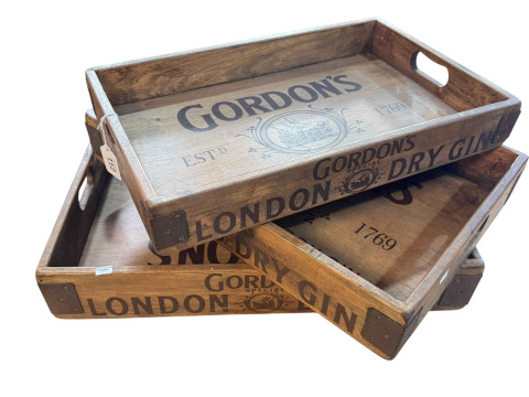 Three novelty graduated advert trays.