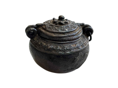 Antique Persian coin pouch made of brass.