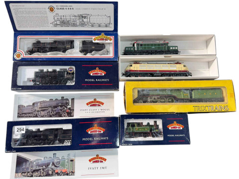 Seven mixed boxed locomotives (Bachmann, Hornby & Trix).
