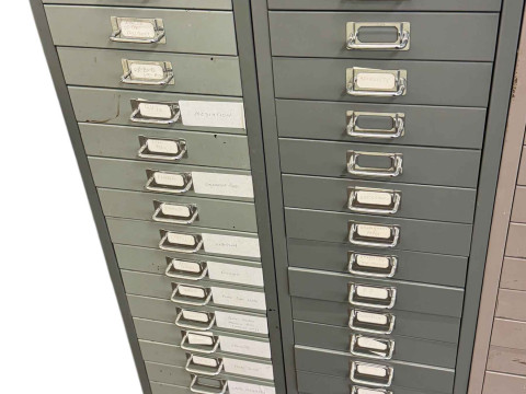 Two Bisley steel fifteen drawer index cabinets, 94cm by 28cm by 41cm.