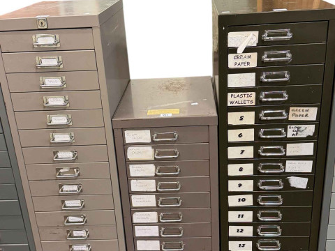 Two fifteen drawer steel index cabinets and ten drawer steel index cabinet...