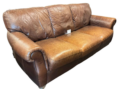 Italian brown leather three seater settee.