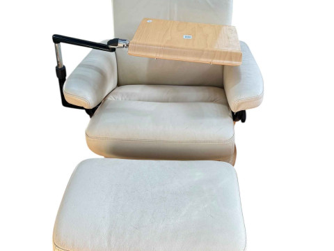 Stressless leather reclining chair and footstool.