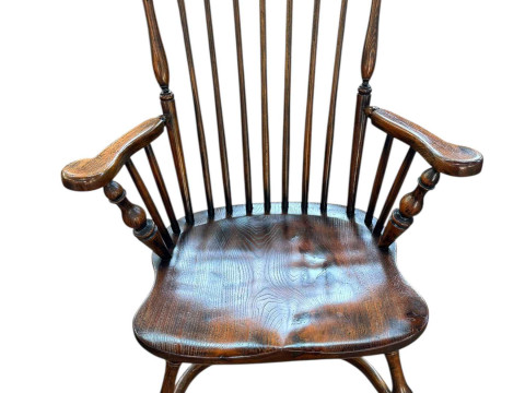 Windsor spoke back elbow chair with crinoline stretcher.