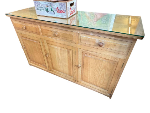 Treske oak sideboard having three drawers above three panelled cupboard...