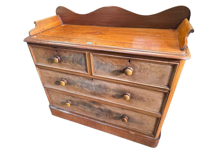 Victorian mahogany Ÿ gallery backed chest of two short above two long drawers on plinth base, 96cm by 107cm by 46cm.