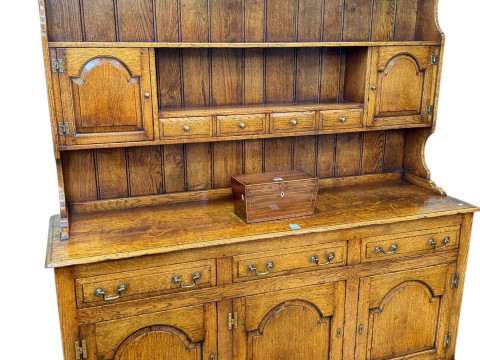 Good quality oak dresser possibly by Titchmarsh & Goodwin?, the shelf...