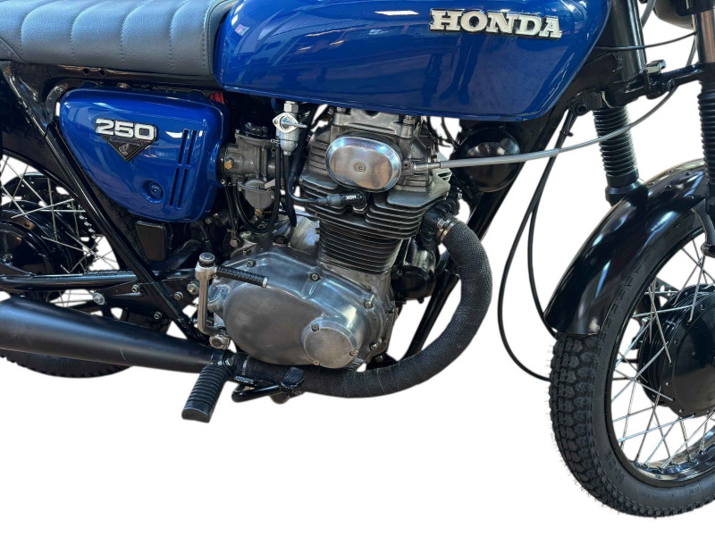 Honda CB250 K4 Motorcycle, Registration Number HFN 629L, first date of registration 25-04-1973, beautifully restored with freshly powder coated wheels, new spokes and bearings front and rear, jack seals, brake shoes, headstock bearings, the bike has electric start button and good compression.