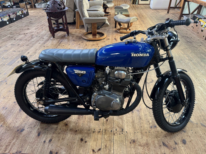 Honda CB250 K4 Motorcycle, Registration Number HFN 629L, first date of registration 25-04-1973, beautifully restored with freshly powder coated wheels, new spokes and bearings front and rear, jack seals, brake shoes, headstock bearings, the bike has electric start button and good compression.