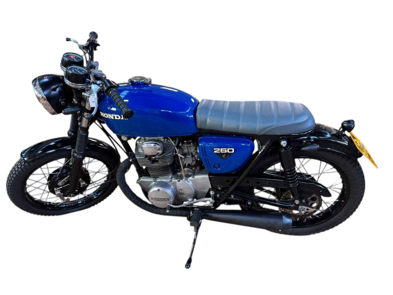 Honda CB250 K4 Motorcycle, Registration Number HFN 629L, first date of registration 25-04-1973, beautifully restored with freshly powder coated wheels, new spokes and bearings front and rear, jack seals, brake shoes, headstock bearings, the bike has electric start button and good compression.