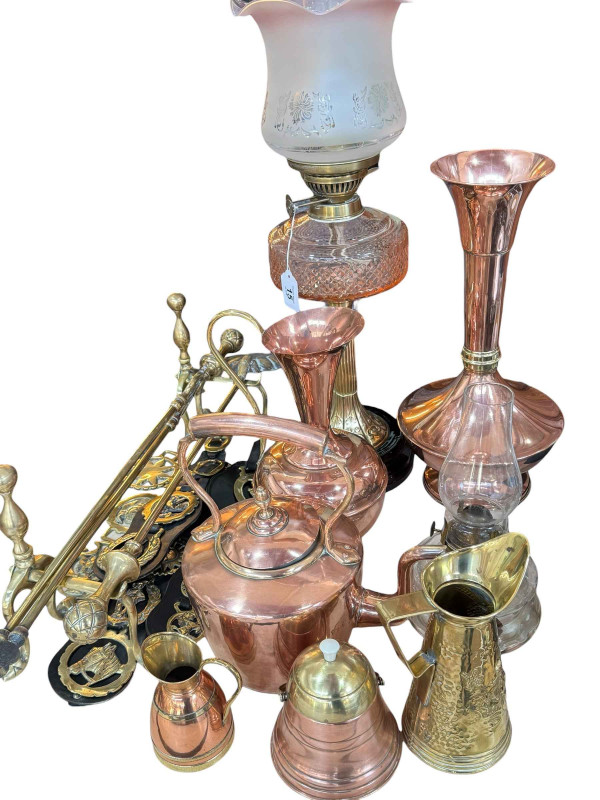 Victorian oil lamp with shade, two brass fire irons with dogs, copper kettle, jug, vase, horsebrasses, etc.