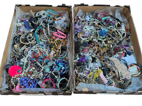 Two boxes of costume jewellery.