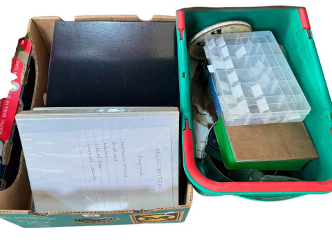 Two boxes of coins, stamps and albums including box of sixpences.