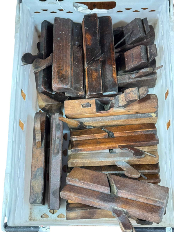 Box of assorted vintage wood planes.