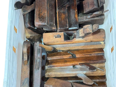 Box of assorted vintage wood planes.