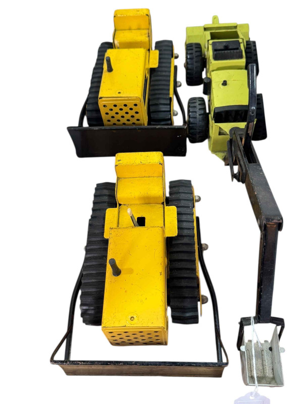 Three Tonka Toy Excavators.
