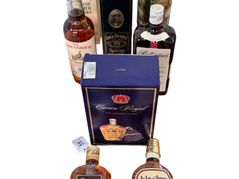Eight assorted bottles of whisky including Jack Daniels, Ballantines and...