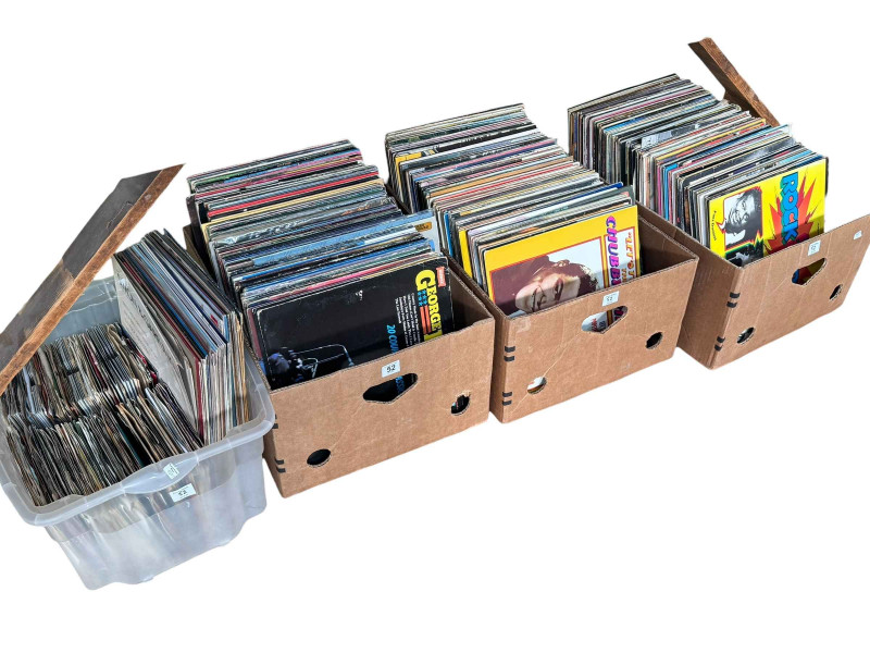 Four boxes of LP and single records.