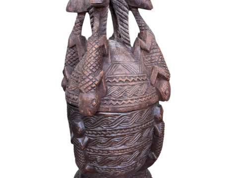 West African tribal art large carved wood three tier vessel and cover, carved and stylised with snakes, antelopes and lizards from Mali, 160cm. thumbnail
