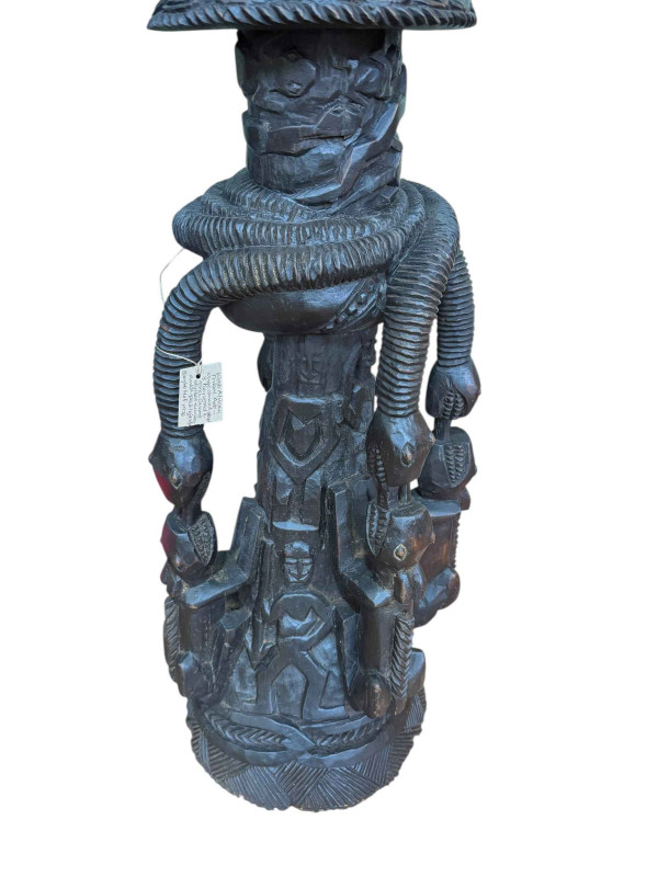 West African tribal art large carved wood three tier vessel and cover, carved and stylised with snakes, antelopes and lizards from Mali, 160cm.