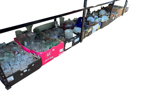 Eleven boxes of glass, china, books, pictures, wall clock and collectables.