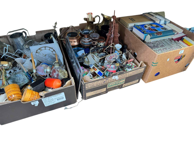 Eleven boxes of glass, china, books, pictures, wall clock and collectables.