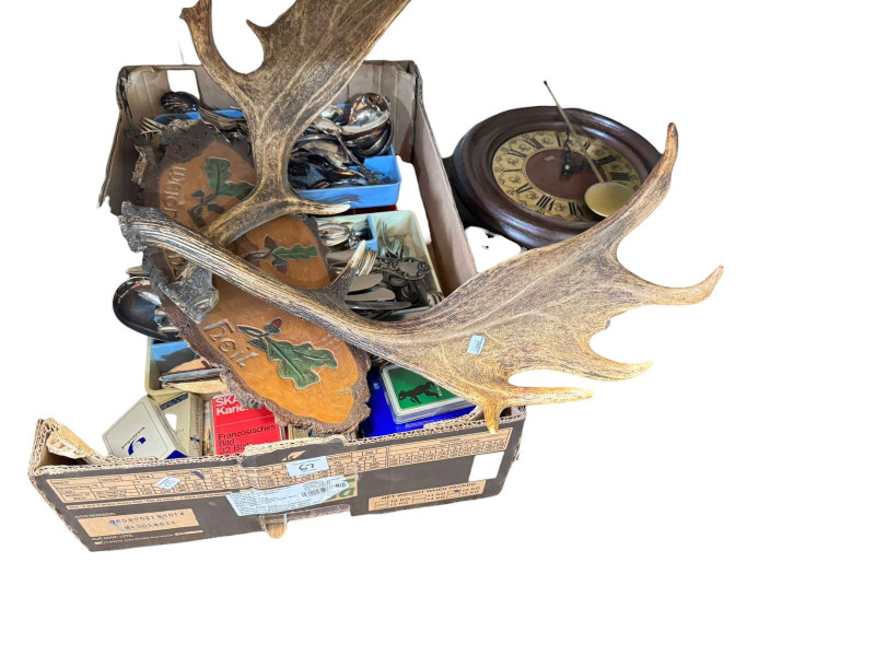 Eleven boxes of glass, china, books, pictures, wall clock and collectables.