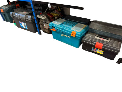 Collection of tool boxes and tools.