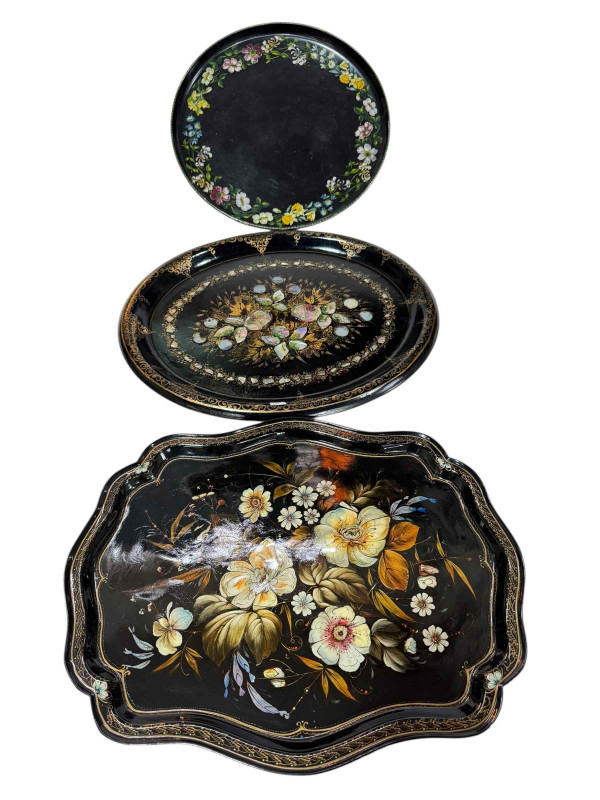 Edwardian inlaid mahogany kidney shaped tea tray, oval papier mache and mother of pearl inlaid tray and two floral painted trays (4).