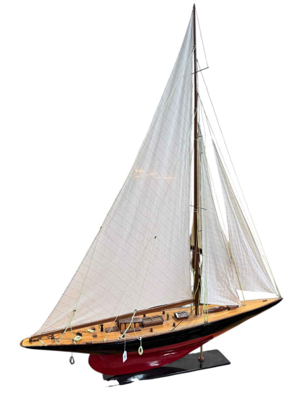 Large four sail pond yacht and stand, yacht 181cm to top of mast, length 148cm, stand 81cm by 164cm by 25.5cm.