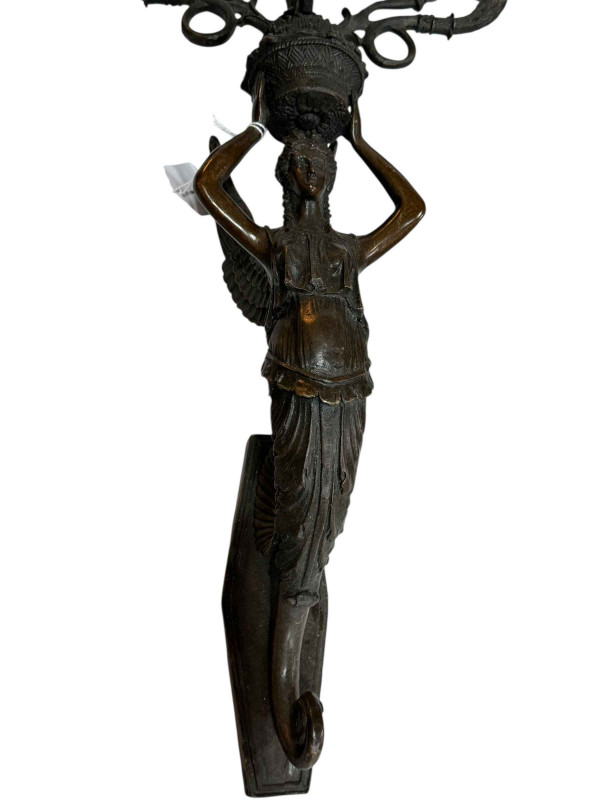 Pair bronze winged figural wall mounted candelabra, 49cm.