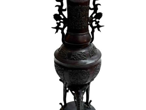 Large Japanese bronze vase with twin handles decorated in relief mythical...