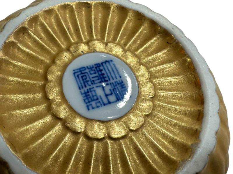 Chinese gilt fluted teapot, blue seal mark, 14cm across.