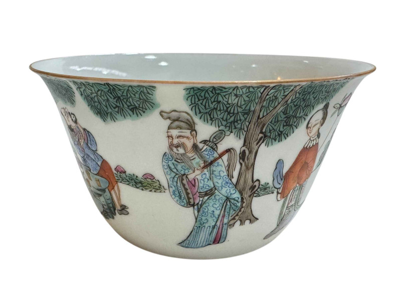 Chinese tea bowl decorated with figures in landscape with Daoguang mark to base.