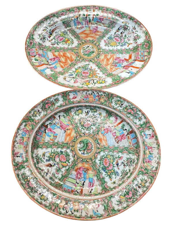 Two large oval Cantonese chargers with floral and figural patterns, 47cm by 42cm.
