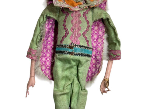 Antique Chinese composite doll in traditional costume.