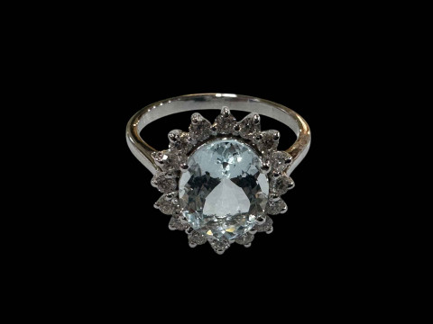 Aquamarine and diamond cluster ring in 18 carat white gold claw setting,...