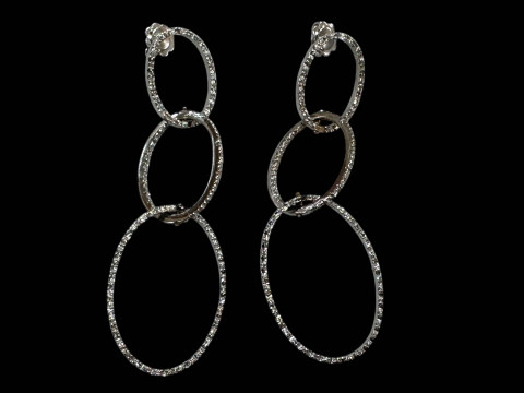 Pair of 18 carat white gold triple oval hoop design diamond earrings.