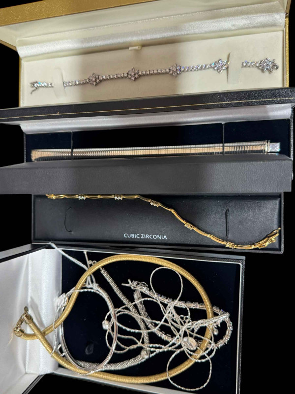 Five silver bracelets (3 boxed), silver bangle and silver necklaces.