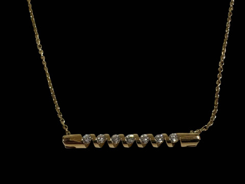 Laing's of Glasgow 18 carat gold necklace with seven stone diamond twist...