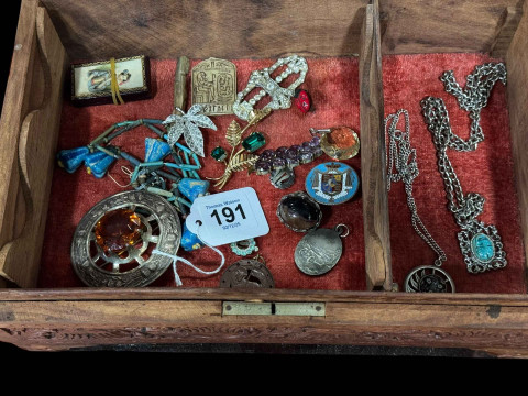 Carved jewellery box with contents including Scottish brooch and silver...