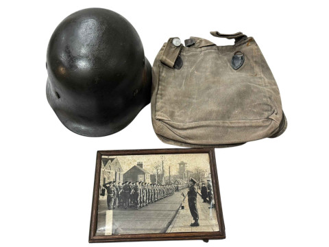 German WWII steel helmet, together with photograph and bread bag (3).
