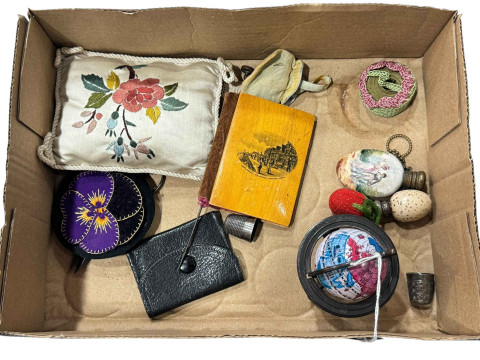 Box with mauchline needle case, scent bottles, miniature globe, etc.