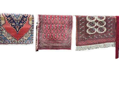 Three various Persian design rugs, largest 1.40 by 0.80.